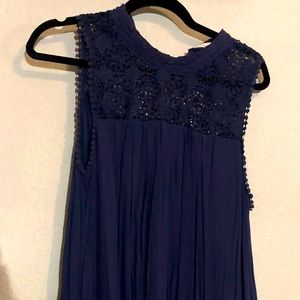 Navy blue just below the knee dress